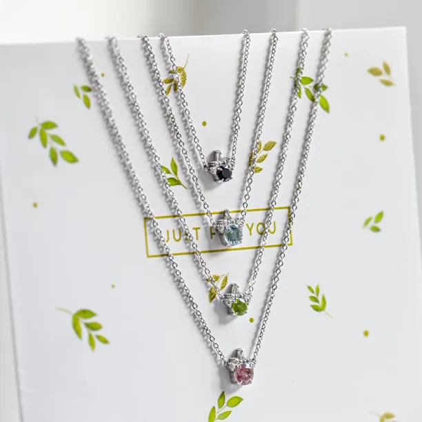 Gold necklace with peridot and diamonds LIME Image