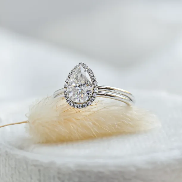 Close-up of the KIMBER engagement ring with pear-shaped moissanite