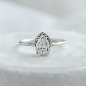 KIMBER engagement ring from a moissanite set with pear-shaped center stone