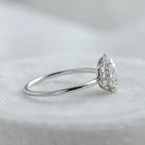 Side view of the KIMBER engagement ring with pear moissanite