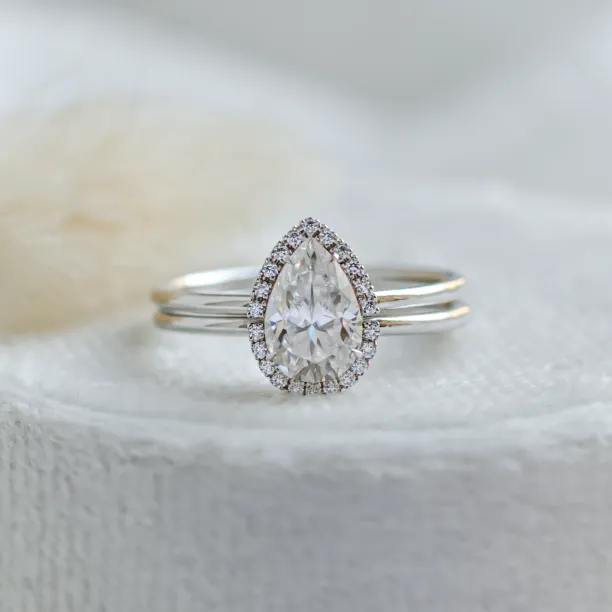 Front view of the KIMBER engagement ring with pear moissanite