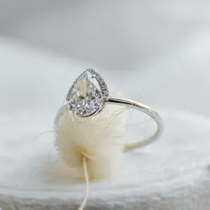 Angled view of the KIMBER engagement ring with pear moissanite