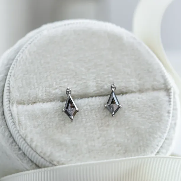 Pair of gold POE earrings with kite salt and pepper diamonds