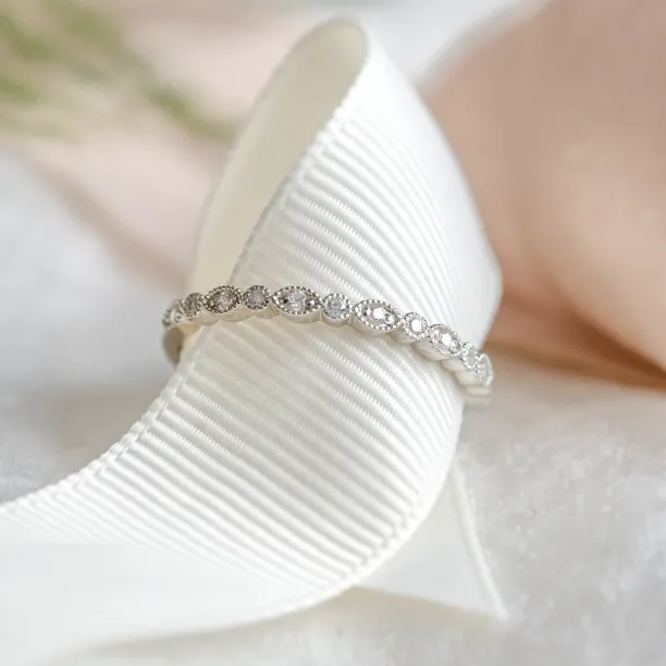 Unusual wedding rings with diamonds in vintage style LAZZI Image