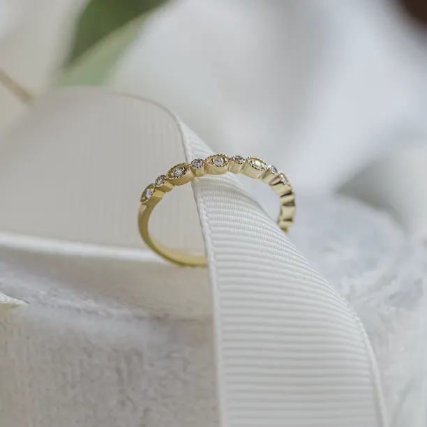Unusual wedding rings with diamonds in vintage style LAZZI Image