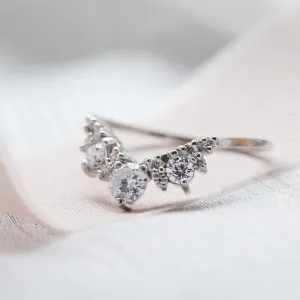 Angled close-up of the FIESTA curved diamond wedding ring