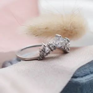 Angled view of the FIESTA curved diamond wedding ring