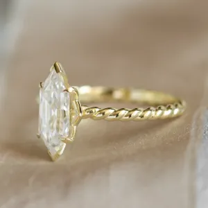 Side detail of the gold SALEM ring with hexagon moissanite