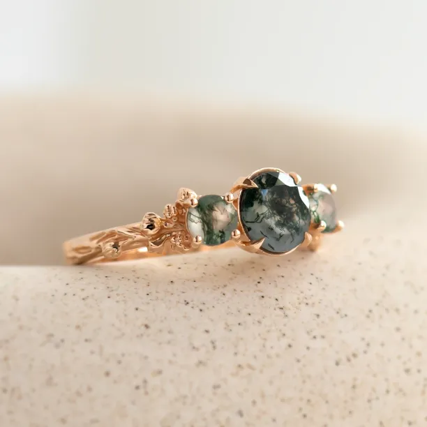 Angled view of the BACCHUS ring with green moss agate details