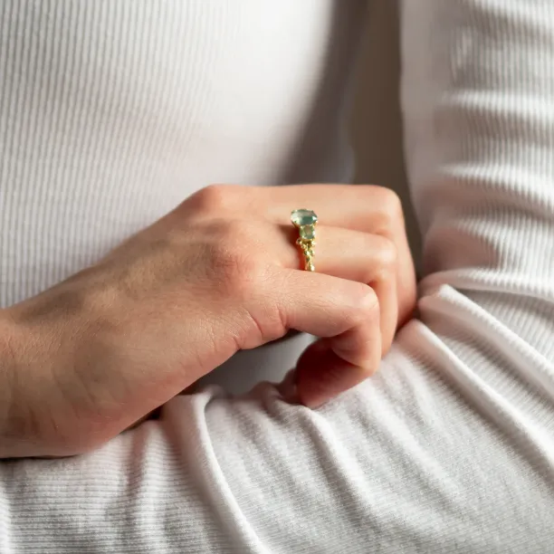 BACCHUS ring with green moss agate worn on a hand
