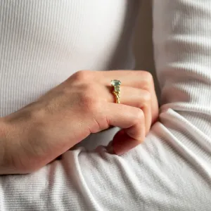 BACCHUS ring with green moss agate worn on a hand