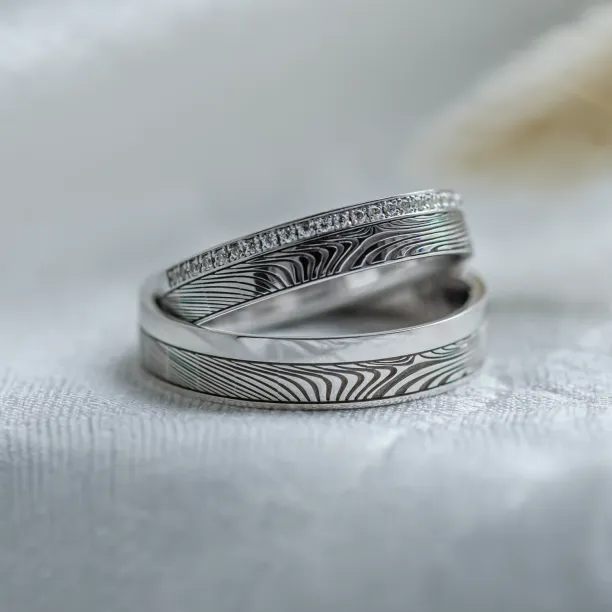 Original wedding rings with relief and diamonds PEACOCK Image