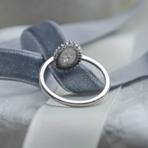 RIDLEY halo engagement ring with salt and pepper diamond, angled view of the setting and band