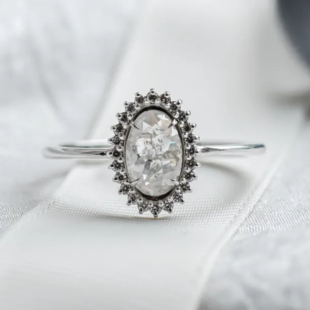 RIDLEY halo engagement ring with an oval salt and pepper diamond