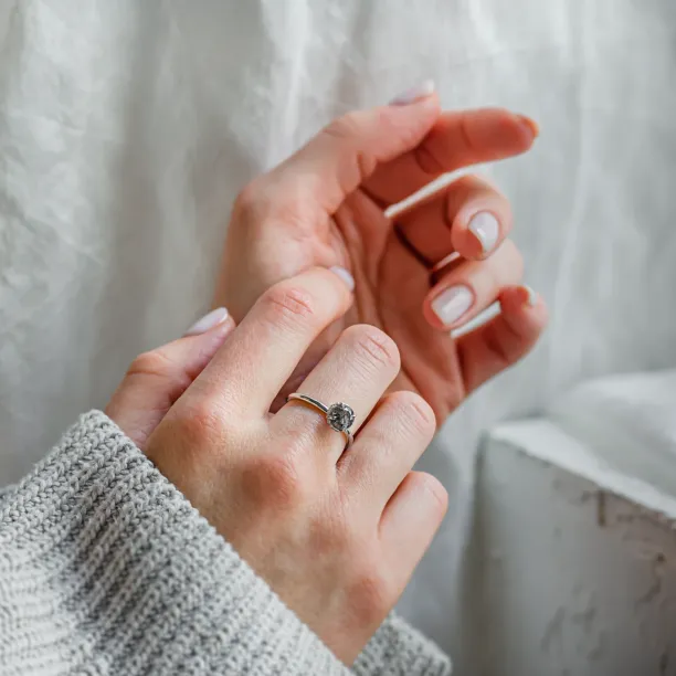 TANAQUIL salt and pepper diamond engagement ring worn on the hand