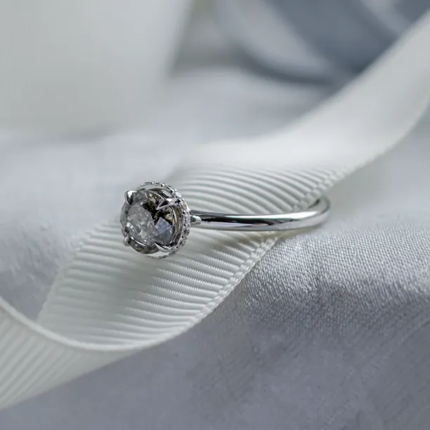 Angled close-up of the TANAQUIL salt and pepper diamond engagement ring