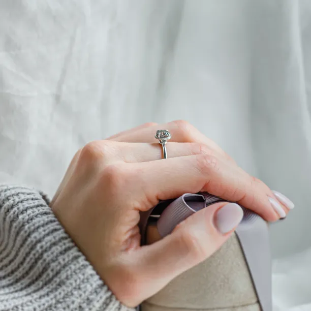TANAQUIL salt and pepper diamond engagement ring worn on the hand, side view