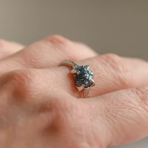 Gold ring with blue raw diamond and unusual rim SKY Image