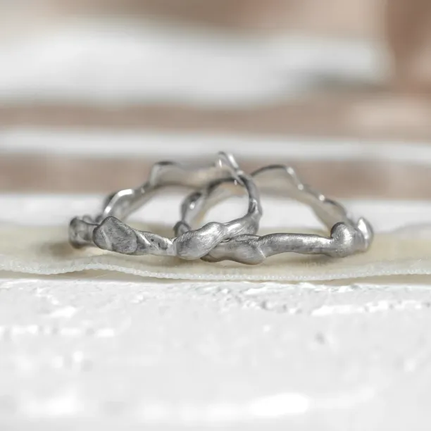 Curved gold wedding rings ZINC Image