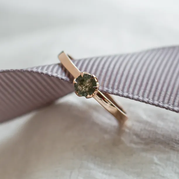 Close-up of the rose gold moss agate ring