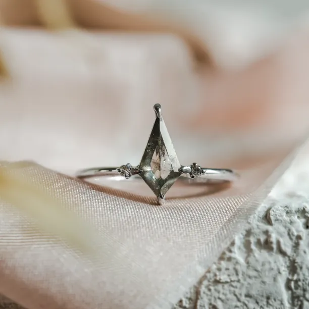 VALENTINO engagement ring with a kite-shaped salt'n'pepper diamond and side diamonds
