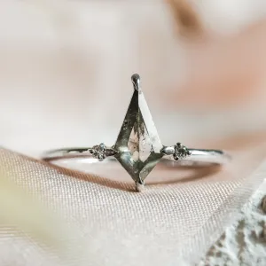 VALENTINO gold engagement ring with a kite-shaped salt'n'pepper diamond and two round diamonds