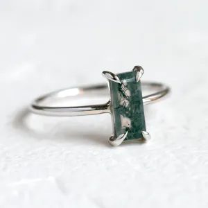 Angled close-up of the FAIRY ring with baguette moss agate