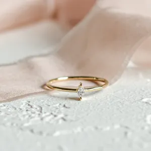 Minimalist engagement ring with marquise diamond, detailed product view