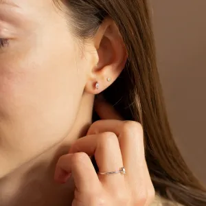 ANTOINETTA engagement ring with marquise diamond worn on the hand near the face