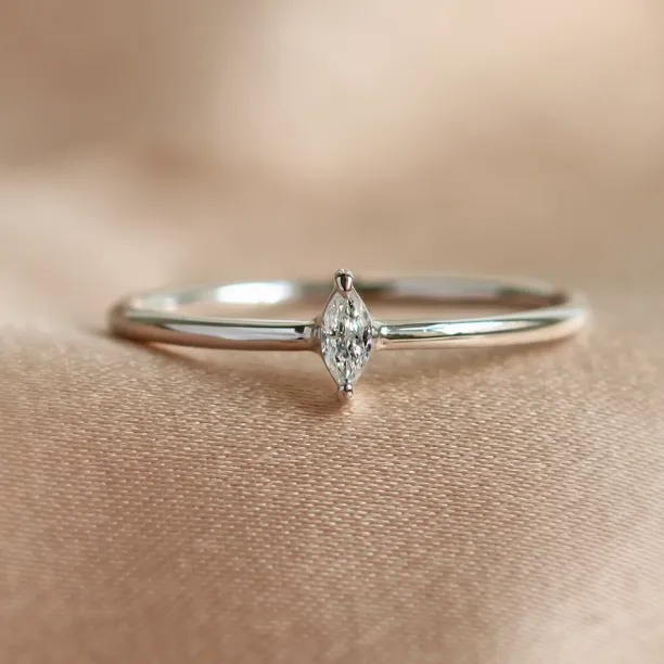 ANTOINETTA minimalist engagement ring with marquise diamond, close-up