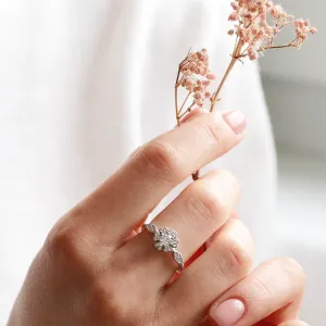 Gold vintage diamond ring CALYPSO worn on a hand in close-up