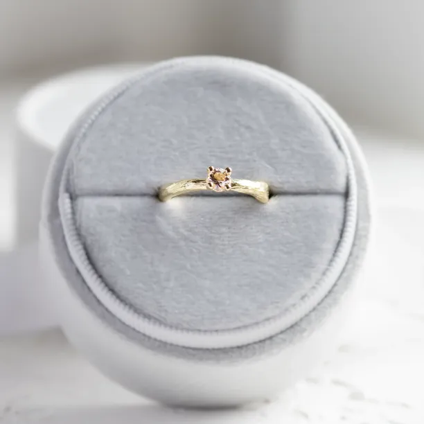 Gold branch ring with morganite shown from an angled view