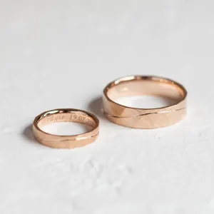 LIDO gold wedding rings showing the hammered surface and engraved interiors