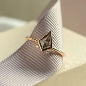 Rose gold CATKIN ring with kite salt and pepper diamond, close-up