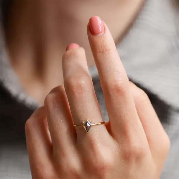 CATKIN ring with kite salt and pepper diamond, worn on a finger