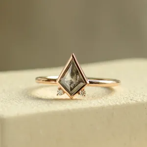 Close-up of CATKIN ring with kite salt and pepper diamond and side diamonds