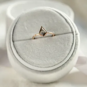 Close-up of the CATKIN gold ring with kite salt and pepper diamond and side diamonds