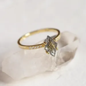 Angled view of ESTER gold ring with kite rutilated quartz and diamonds