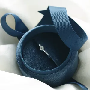 Angled view of the NOLLAIG diamond engagement ring
