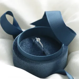 NOLLAIG diamond engagement ring shown from an angled side view