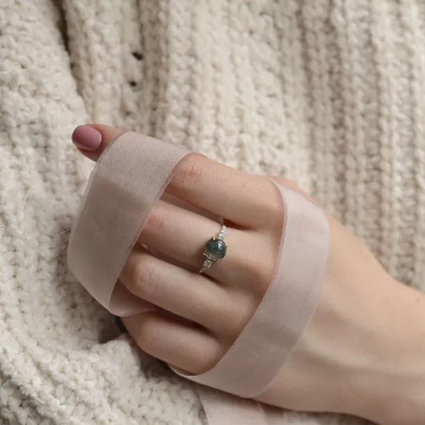 FIONNUALA gold ring with cabochon moss agate and diamonds worn on the hand