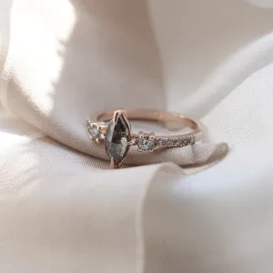 Close-up of the ROISIN gold ring with a marquise salt and pepper diamond