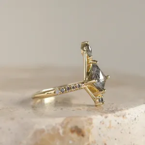 Side view of the SANIA ring showing its geometric diamond setting