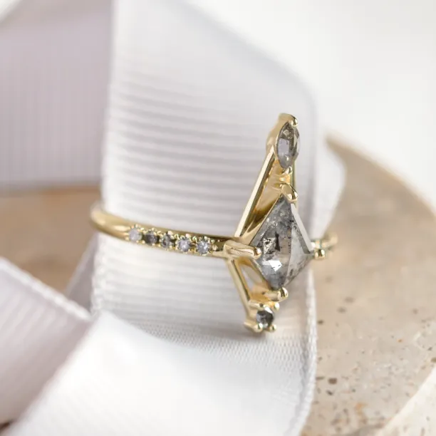 Close-up of the SANIA ring with a large salt and pepper diamond