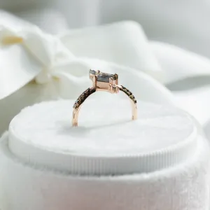 Profile view of SANIA ring showing the raised geometric setting and diamond-set band