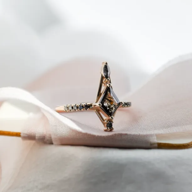 SANIA ring with kite-shaped salt and pepper diamond and marquise diamond in an angled view