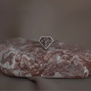 Gold ALMONTE ring with rutile quartz shown on a stone