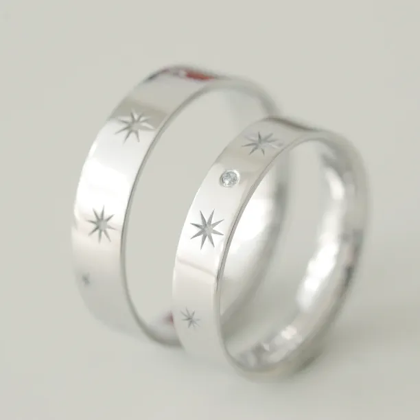 Gold wedding rings with stars and diamond STAR Image
