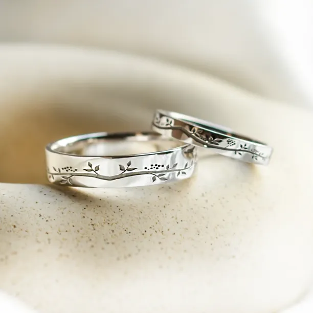 Gold wedding rings with plant motif MIKA Image