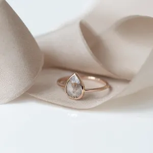 XENA gold ring with a faceted salt and pepper diamond in a teardrop shape